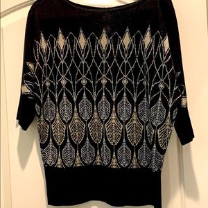 Black sweater with gold and silver pattern